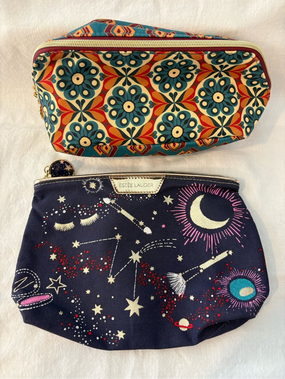 2 Unused Estée Lauder Zippered Cosmetic Bags Stars/Moon & Geometric